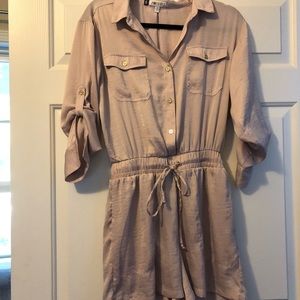 XS Romper light mauve/pink color.